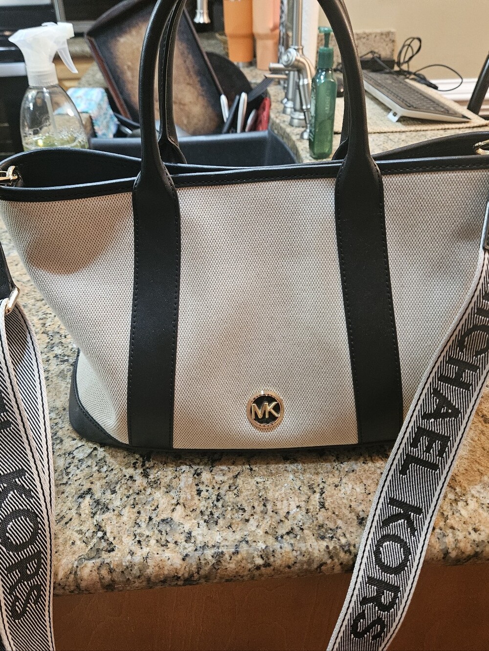 Michael Kors Beige Canvas Tote with Black Trim and MK Logo